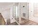 Upstairs hallway with glass railing and modern flooring at 21048 Peachland Blvd, Port Charlotte, FL 33954