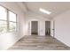 Bright bedroom with wood-look flooring and skylight at 21048 Peachland Blvd, Port Charlotte, FL 33954