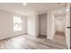 Bright bedroom with wood-look floors and spacious closet at 21048 Peachland Blvd, Port Charlotte, FL 33954