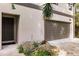 Dark brown garage door and landscaping at 21048 Peachland Blvd, Port Charlotte, FL 33954