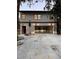 Modern two-car garage with concrete driveway at 21048 Peachland Blvd, Port Charlotte, FL 33954
