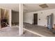Unfinished garage with concrete floor and water heater at 21048 Peachland Blvd, Port Charlotte, FL 33954