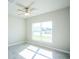 Bedroom with large window and ceiling fan at 285 Porto Alegre St, Punta Gorda, FL 33983