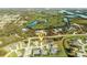 Aerial view showcasing waterfront property and lush landscape at 285 Porto Alegre St, Punta Gorda, FL 33983