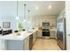 Modern kitchen featuring stainless steel appliances and a large island at 285 Porto Alegre St, Punta Gorda, FL 33983