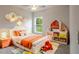 Cheerful bedroom with colorful decor and built-in shelving at 285 Porto Alegre St, Punta Gorda, FL 33983