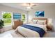 Spacious bedroom with large windows and a dresser at 285 Porto Alegre St, Punta Gorda, FL 33983