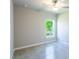 Bedroom with window and ceiling fan at 285 Porto Alegre St, Punta Gorda, FL 33983