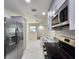 Modern kitchen with stainless steel appliances and granite countertops at 3915 W San Pedro St, Tampa, FL 33629