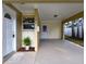Covered carport with space for one car and extra storage at 3915 W San Pedro St, Tampa, FL 33629