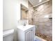 Updated bathroom with a walk-in shower and modern vanity at 3915 W San Pedro St, Tampa, FL 33629