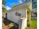 View of the side of the house, showing the exterior and landscaping at 3915 W San Pedro St, Tampa, FL 33629