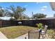 Fenced backyard with patio and grill at 4237 Dr Martin Luther King Jr N St, St Petersburg, FL 33703