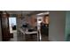 Dining room with access to kitchen and another room at 7054 Hibiscus S Ave, South Pasadena, FL 33707