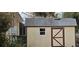 Practical storage shed in the backyard, offering extra space at 7054 Hibiscus S Ave, South Pasadena, FL 33707