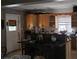 Kitchen with light wood cabinets and an island at 7054 Hibiscus S Ave, South Pasadena, FL 33707