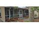 Inviting screened porch, perfect for enjoying the outdoors at 7054 Hibiscus S Ave, South Pasadena, FL 33707