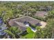 Aerial view of the home, highlighting its size and lot in relation to neighbors at 811 Grove Park Ave, Tampa, FL 33609