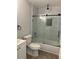 Updated bathroom with a glass shower door and modern vanity at 847 Hand Ave, Sarasota, FL 34232