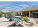 Inviting pool with a waterfall feature at 1433 Emerald Hill Way, Valrico, FL 33594