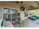 Spacious lanai with seating and TV at 1433 Emerald Hill Way, Valrico, FL 33594