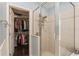 Bathroom with walk-in closet and shower at 1433 Emerald Hill Way, Valrico, FL 33594