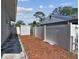 Small backyard with a shed and a privacy fence at 1757 New Hampshire Ne Ave, St Petersburg, FL 33703