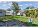 Spacious backyard, grassy area, and a wooden structure at 1757 New Hampshire Ne Ave, St Petersburg, FL 33703