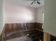 Bedroom undergoing renovation with exposed flooring and framing at 1757 New Hampshire Ne Ave, St Petersburg, FL 33703