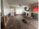 Living room undergoing renovation with exposed flooring and walls at 1757 New Hampshire Ne Ave, St Petersburg, FL 33703