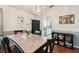 Dining area with marble table and kitchen view at 19606 Morden Blush Dr, Lutz, FL 33558