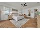 Spacious main bedroom with walk-in closet and herringbone floors at 2591 Grand Cypress Blvd, Palm Harbor, FL 34684