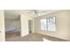 The bedroom features a large window allowing for natural light and a closet at 3076 Eastland Blvd # 106, Clearwater, FL 33761