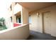 Building's exterior featuring a light-colored wall and a unit number at 3076 Eastland Blvd # 106, Clearwater, FL 33761