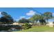 Northwood Plaza shopping center with pond at 3076 Eastland Blvd # 106, Clearwater, FL 33761