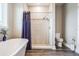 Bathroom featuring a soaking tub, shower, and toilet at 7775 Abby Brooks Cir, Wesley Chapel, FL 33545