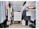 Large walk-in closet with ample shelving and hanging space at 9000 Commodore Dr # 401, Seminole, FL 33776