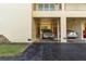Covered parking garage with assigned parking spaces at 9000 Commodore Dr # 401, Seminole, FL 33776