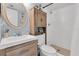 Clean bathroom with single vanity and shower at 9000 Commodore Dr # 401, Seminole, FL 33776