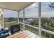 Spacious screened balcony overlooking a residential neighborhood at 9000 Commodore Dr # 401, Seminole, FL 33776