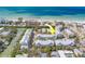 Aerial view of the property near the water at 94 The Cove Way, Indian Rocks Beach, FL 33785