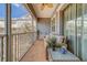 Screened balcony with outdoor seating and ceiling fan at 94 The Cove Way, Indian Rocks Beach, FL 33785