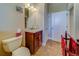 Simple bathroom with single vanity and toilet at 94 The Cove Way, Indian Rocks Beach, FL 33785