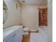 Clean bathroom with a bathtub and shower at 94 The Cove Way, Indian Rocks Beach, FL 33785