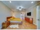 Spacious main bedroom with wood floors and plenty of natural light at 94 The Cove Way, Indian Rocks Beach, FL 33785