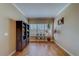 Bright home office with built-in shelving and large window at 94 The Cove Way, Indian Rocks Beach, FL 33785