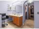 Vanity area with a large mirror and built-in cabinets at 2102 Deltona Blvd, Spring Hill, FL 34606
