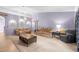 Living room with vaulted ceiling and neutral decor at 2102 Deltona Blvd, Spring Hill, FL 34606