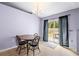 Small dining area with a round table and four chairs at 2102 Deltona Blvd, Spring Hill, FL 34606