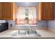Kitchen sink with double basin and window at 2102 Deltona Blvd, Spring Hill, FL 34606